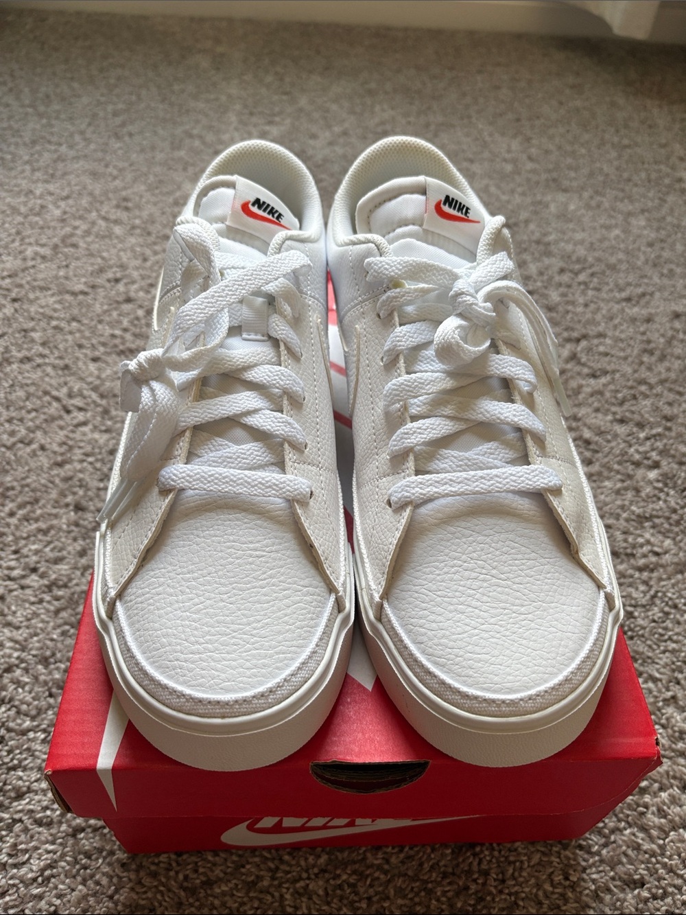 Nike White Low-Top Sneakers with Subtle Black Logo - NWOT